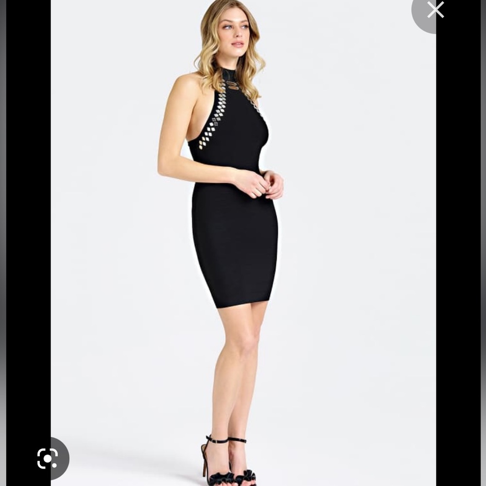 Black with silver design details. Bodycon, flattering stretch, classic Marciano.